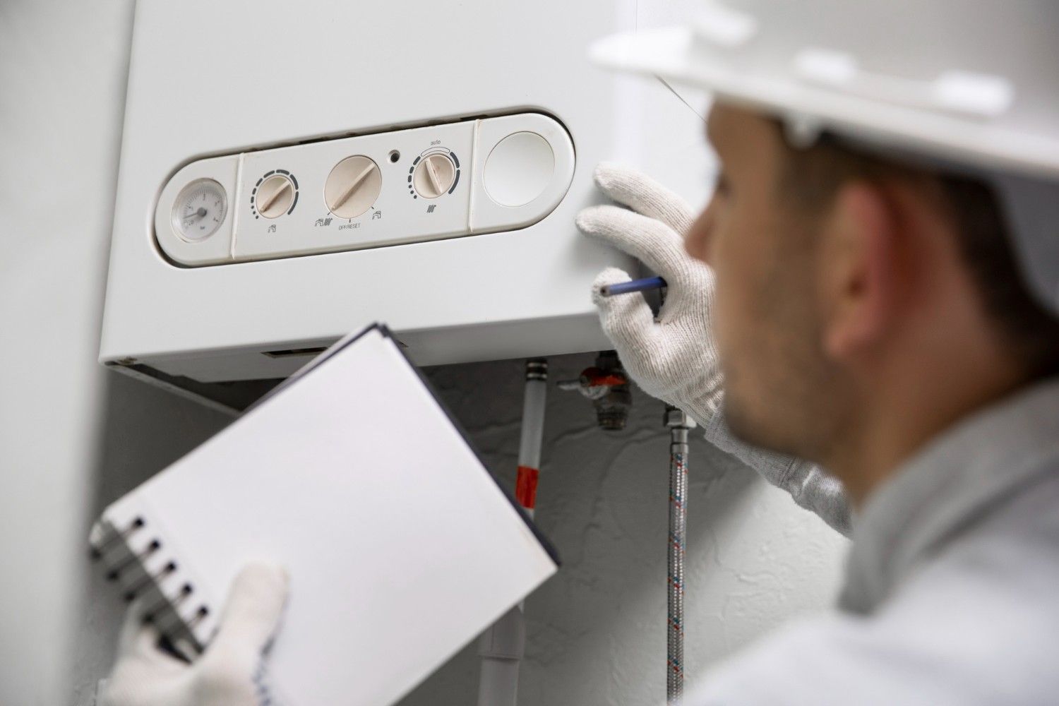 Engineer carrying out a boiler repair in Richmond
